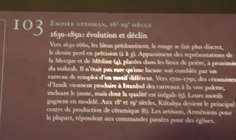 Blue cross with an extended lower arm